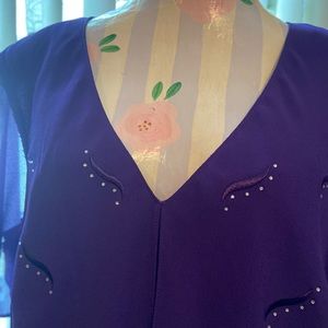 Karin Stevens mother of the bride deep purple gown